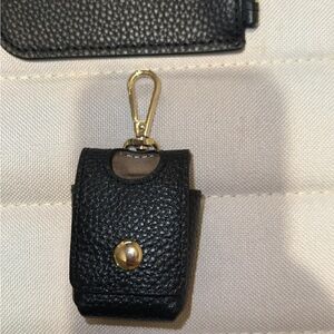 Bandolier Black Leather Hand Sanitizer accessory with Gold Hardware